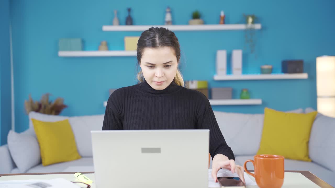 Young entrepreneur woman working in home office suffers from attention deficit problem.