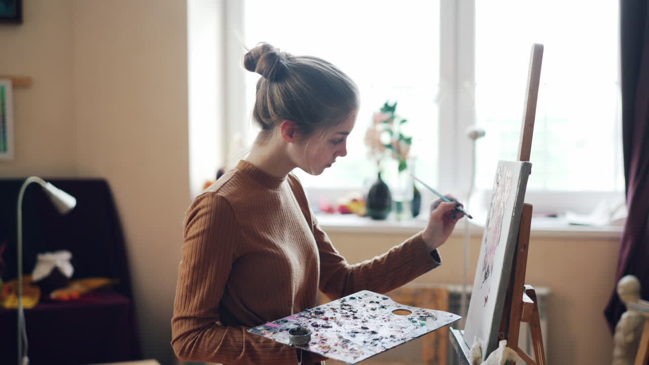 Woman Painting in an Art Studio