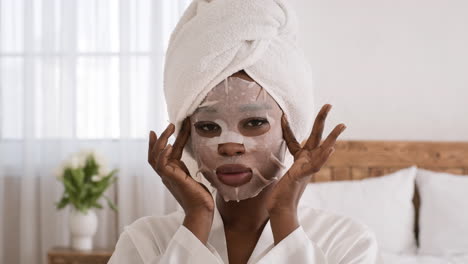 woman applying face mask