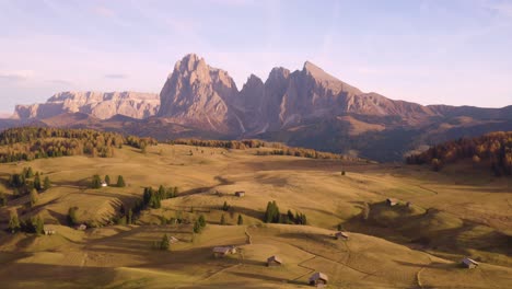 aerial boom shot reveals famous seiser alm landscape in italian dolomites