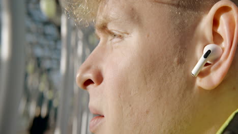 man wearing earbuds