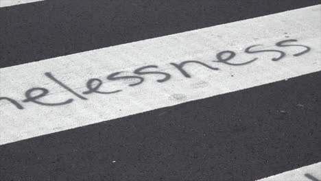 street graffiti at homeless protest encampment