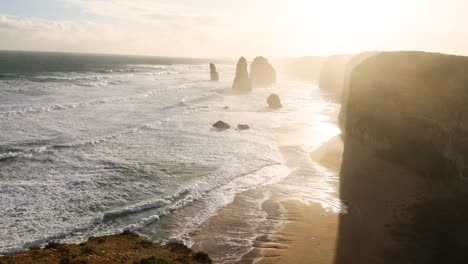 sunset over ocean and rock formations