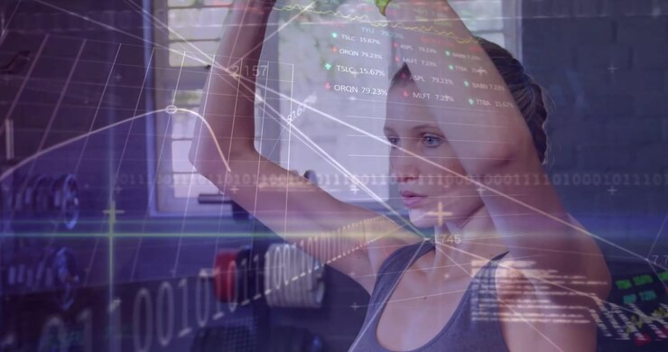 Woman holding orange med ball at chest starting overhead press in gym workout data overlay moving