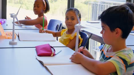 Schoolkids-studying-at-desk-in-the-classroom-at-school-4k