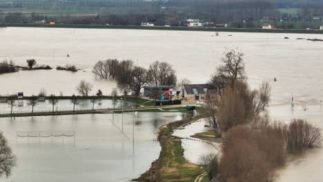 severe rainfall cause large scale flooding in gelderland countryside, aerial