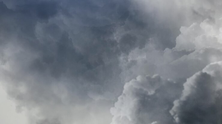 4k view of thunderstorm, flying through dark clouds