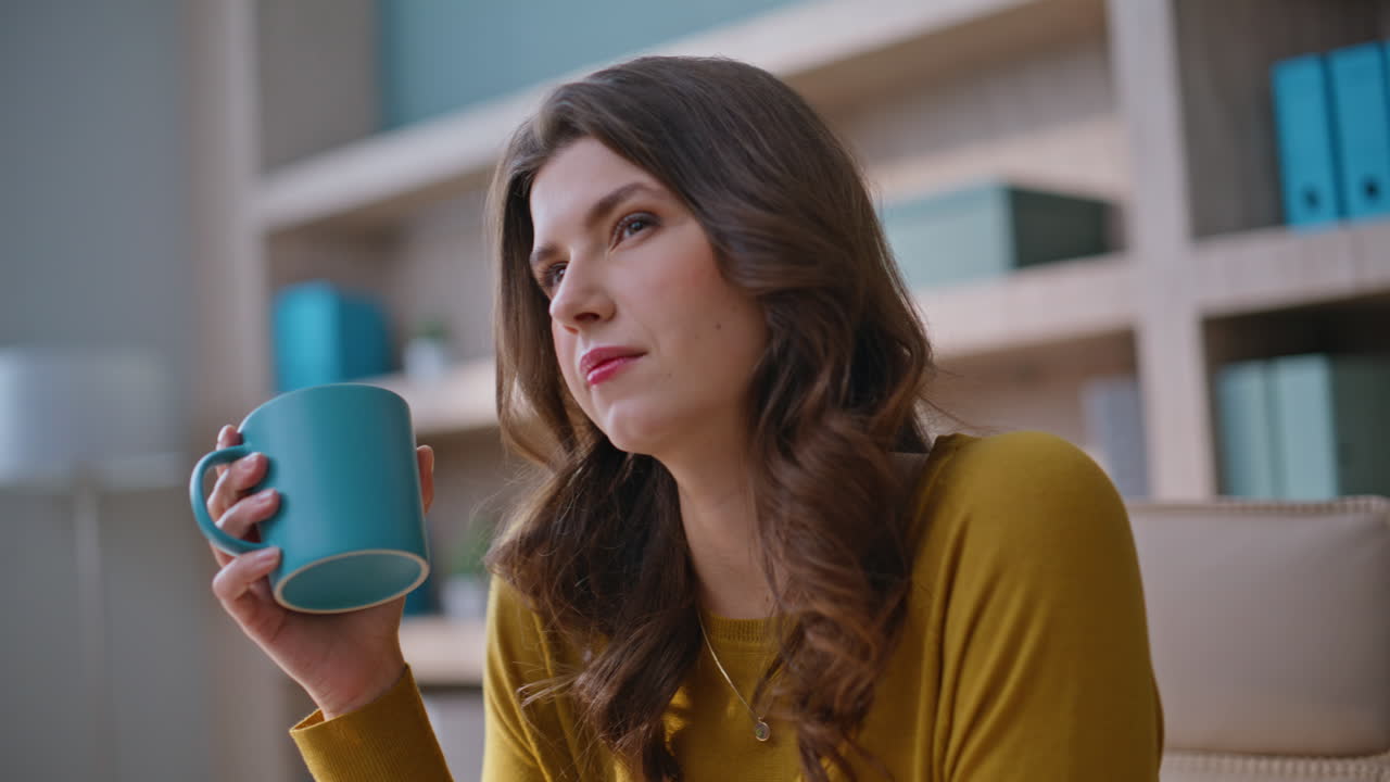 Manager making work break taking coffee cup at workplace closeup. Pensive woman