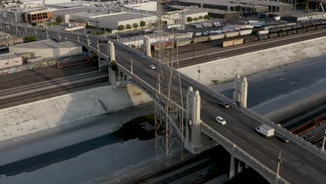 City-Outskirts-Bridge-in-Los-Angeles-Industrial-District---Static-Aerial-Overhead-Drone-View