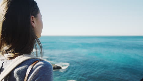 de vuelta, mujer y océano por la paz