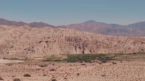 drone advancing over mountains in the beautiful cachalquie valley in salta