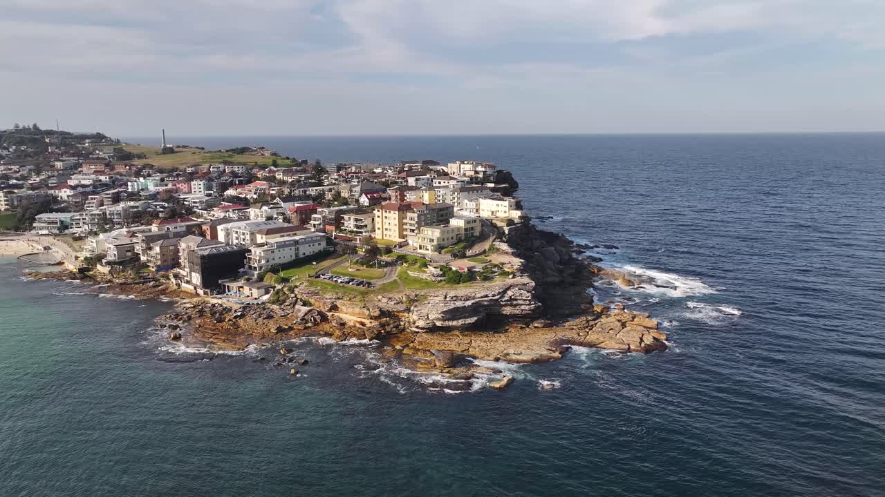 Aerial View of a Coastal Town on a Cliffside