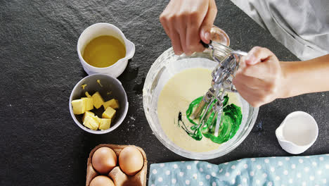 woman whisking batter 4k