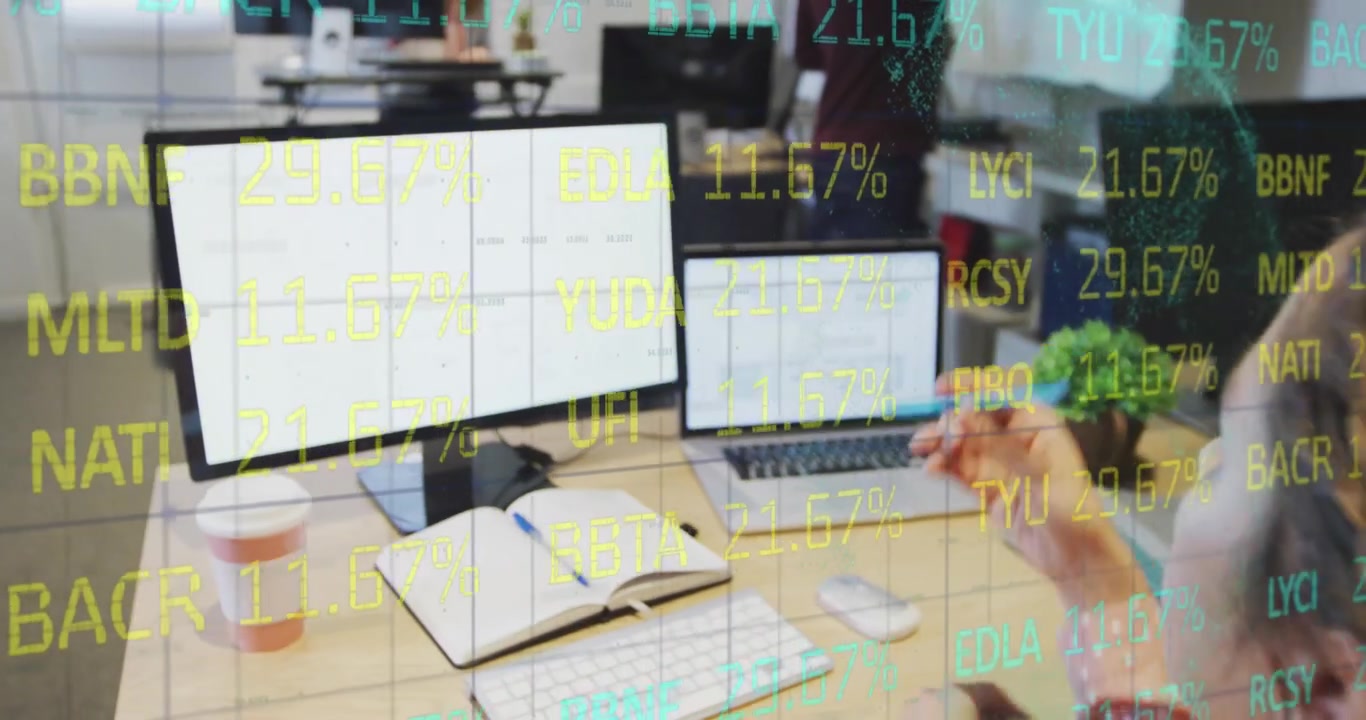 Composite of financial data processing over businesswoman using computer in office