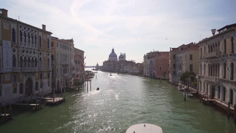 Boats-And-Buildings-On-The-Grand-Channel-at-early-morning-in-Venice,-Italy