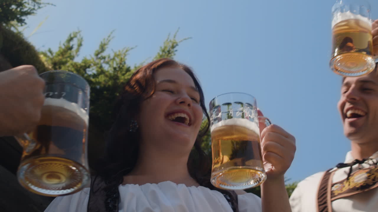 People celebrating Oktoberfest with beer