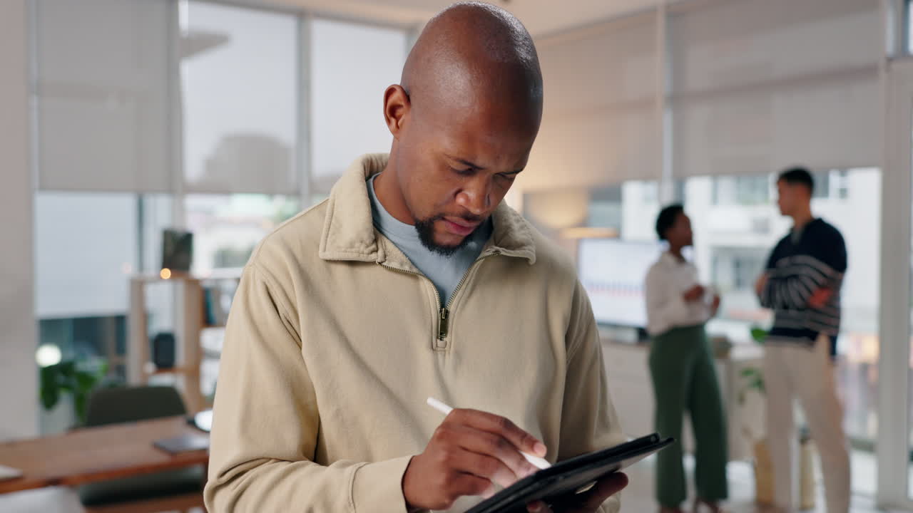 Man using tablet in office setting