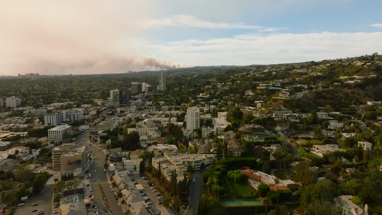 4K aerial of the LA fires in January 2025 from West Hollywood, Los Angeles, California, USA.