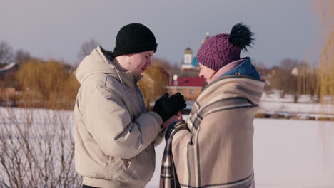 couple in love on a snowy winter day