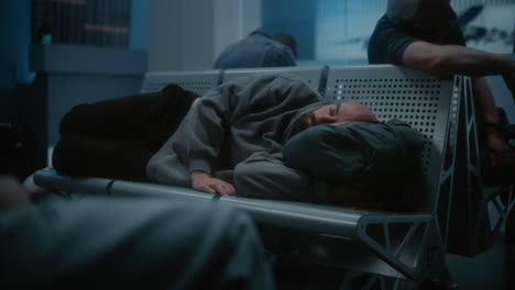 sleeping passenger at airport