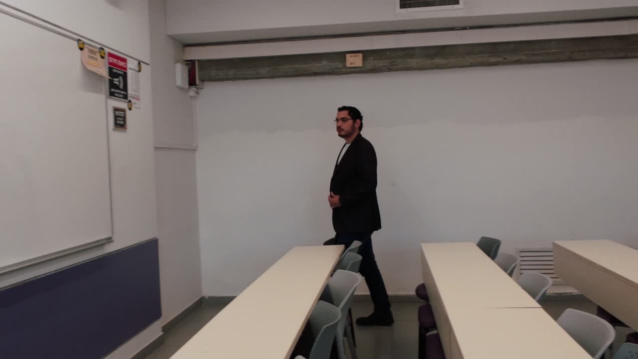University Professor Enters Lecture Room