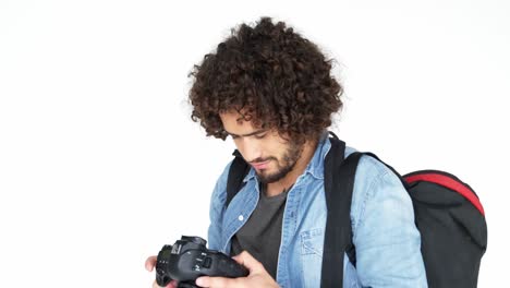 photographer taking photo with professional digital camera