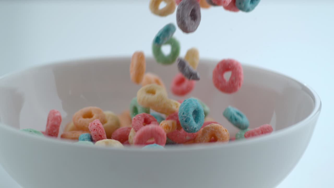 Cereal pouring into bowl in slow motion