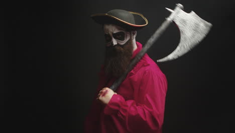 scary bearded man dressed up like a pirate