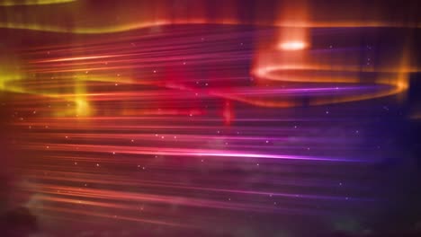 animation of red, yellow and pink aurora borealis lights moving over night sky with stars