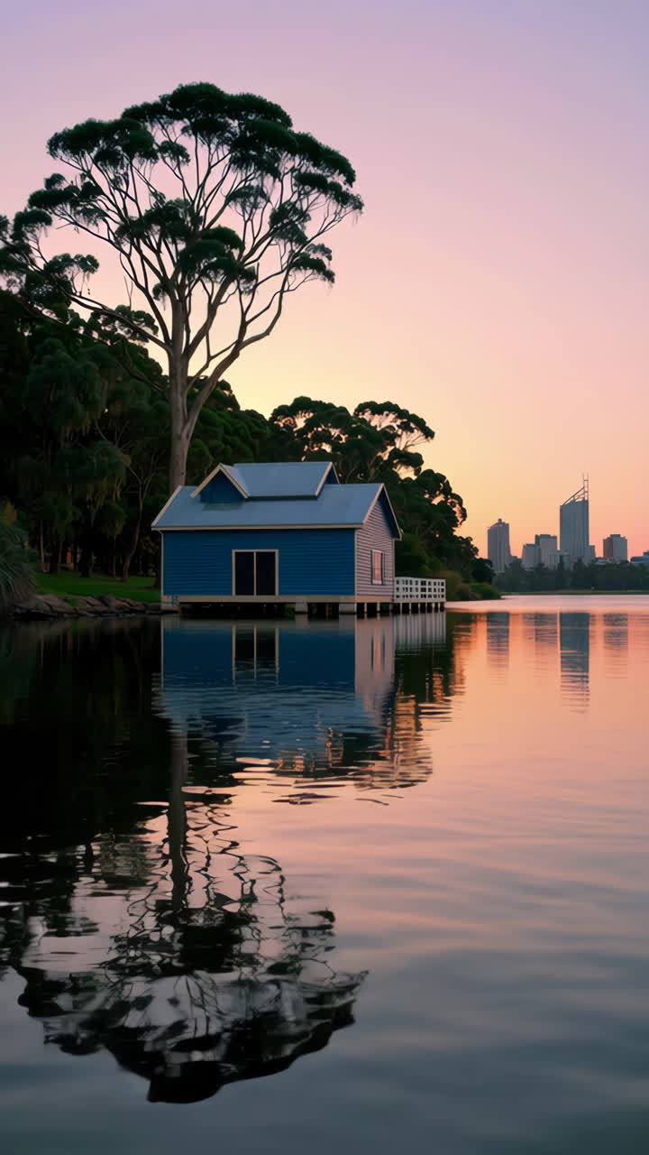 Iconic Blue Boat Shed on Swan River at Sunset in Perth