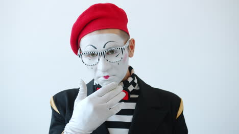 mime artist with sad expression