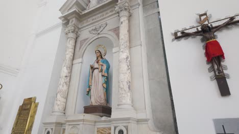 statue of mary stands serene in santa marta's cathedral basilica, colombia