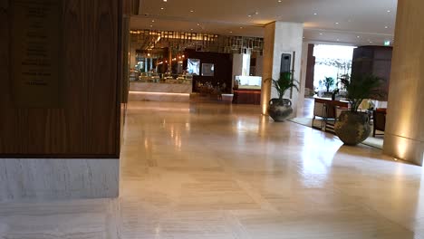 automatic doors open to reveal a luxurious lobby