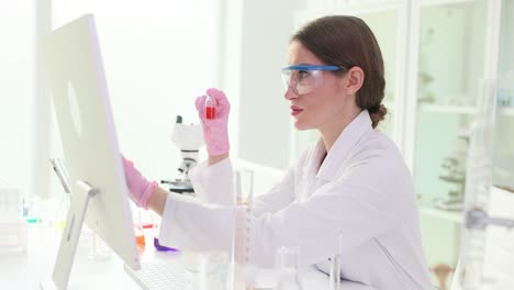 female scientist analyzing samples in a laboratory