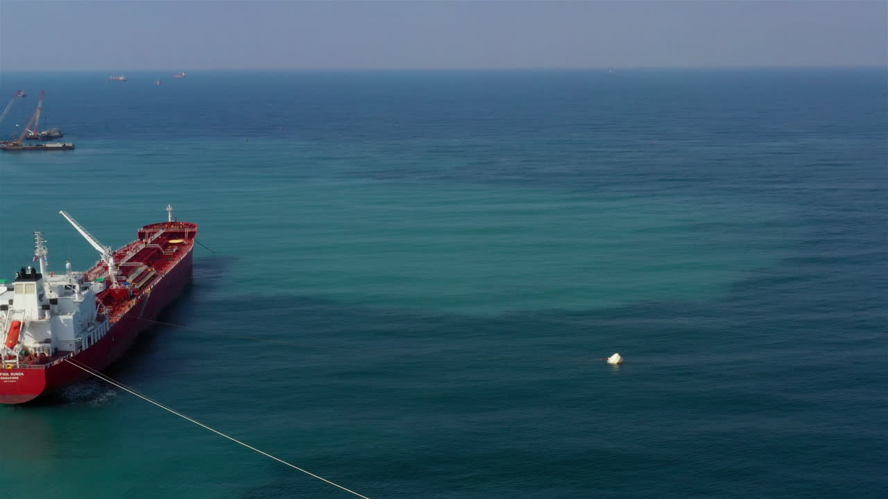 Oil Chemical Tanker Tied with strings Close to port Aerial Footage