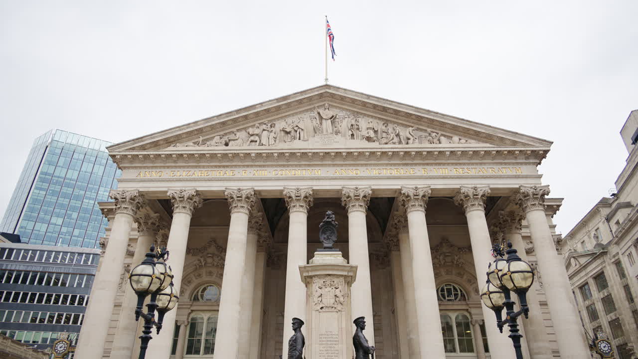 Royal Exchange building with surrounding skyscrapers in London, England