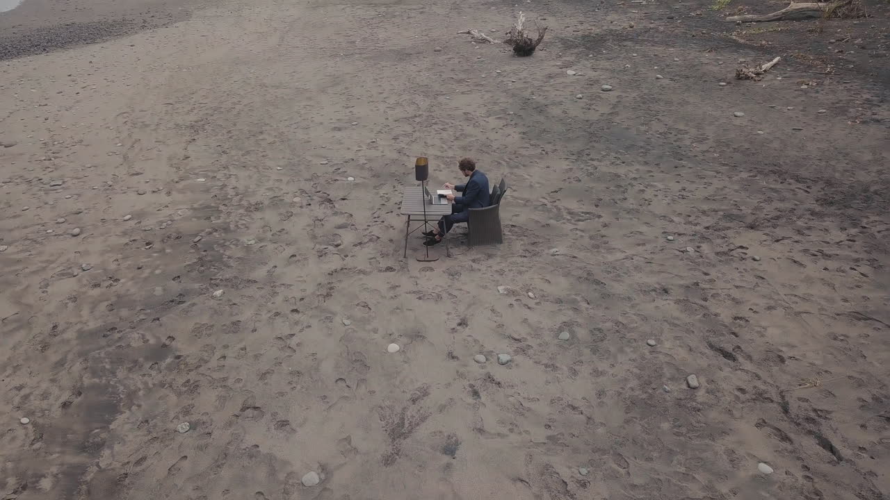 Man Working On Beach In Bali