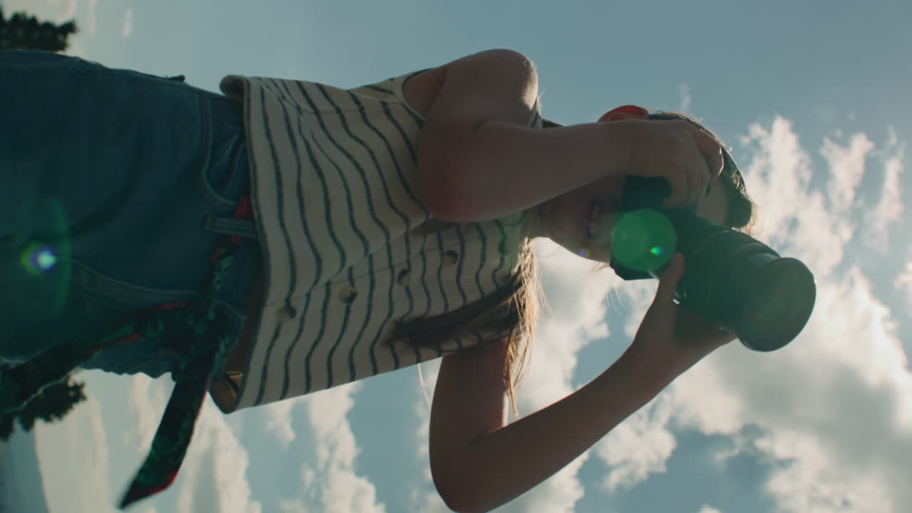 Young Girl Photographer Shooting Landscape Young Photographer Shooting Landscape on Beautifull Green Hillway Taking Pictures of Nature Girl Filling the Portfolio with Amazing Photos Spending Leisure Time Outdoor Slow Motion