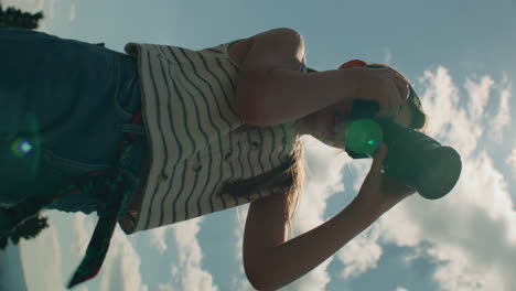 young girl photographer shooting landscape young photographer shooting landscape on beautifull green hillway taking pictures of nature girl filling the portfolio with amazing photos spending leisure time outdoor slow motion