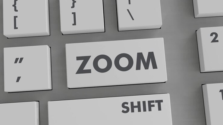 pulsando el botón de zoom en el teclado