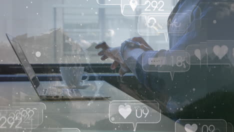 animation of social media icons over woman using laptop