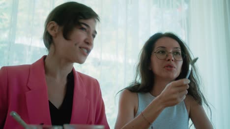 two women eating lunch