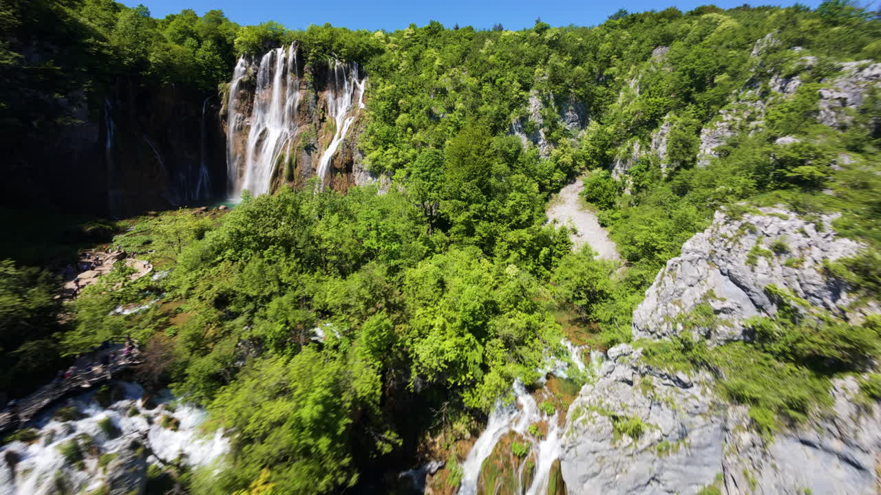 Waterfalls And Limestone Canyons At The Famous Plitvice Lakes National Park In Croatia. FPV