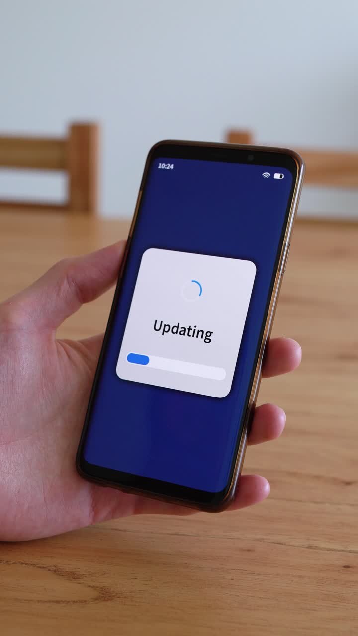 Vertical shot of smartphone doing software update