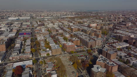 Fly-above-large-housing-estate.-Aerial-panoramic-shot-of-apartment-buildings-in-residential-borough.-Queens,-New-York-City,-USA