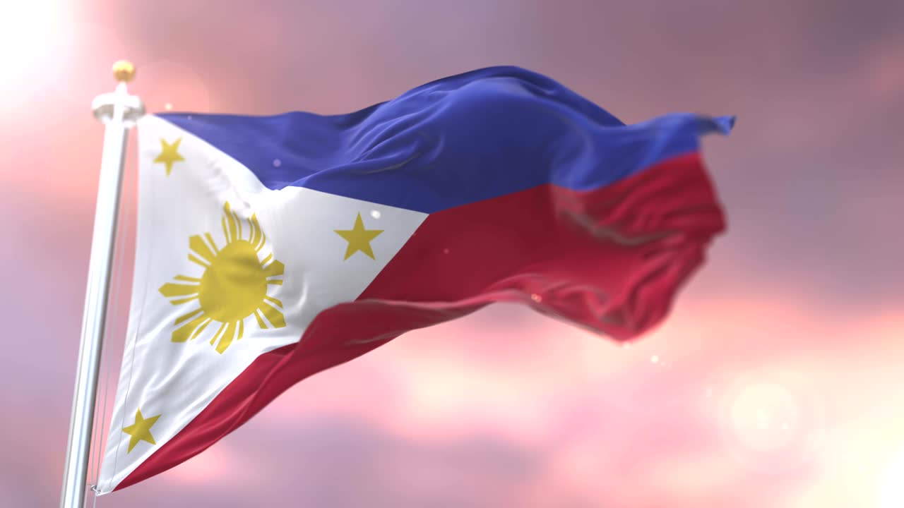 Flag of the Philippines waving at wind in slow at sunset, loop