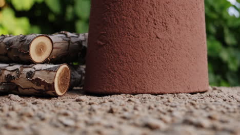 firewood and decorative cylinder