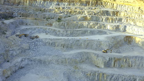 aerial view of an active quarry with machinery