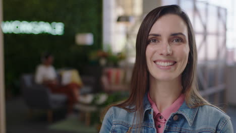 portrait caucasian business woman smiling confident happy entrepreneur enjoying successful startup company proud female manager arms crossed in trendy office workspace