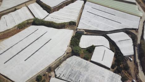 Aerial-view-of-greenhouses-in-a-mountain-of-the-south-of-Spain